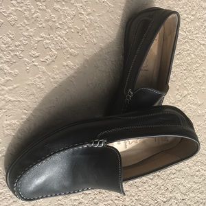 Slip on, black Ecco genuine leather.